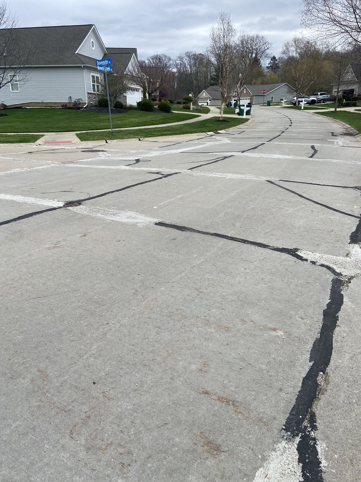 FibreCrete polymer joint repair on residential street by Asphalt Fabrics & Specialties