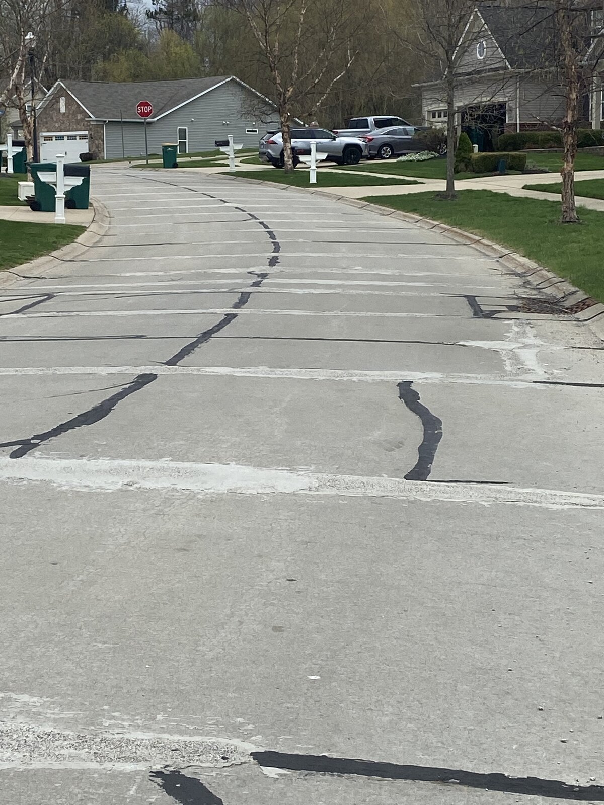 FibreCrete polymer joint repair on residential cul-de-sac by Asphalt Fabrics & Specialties